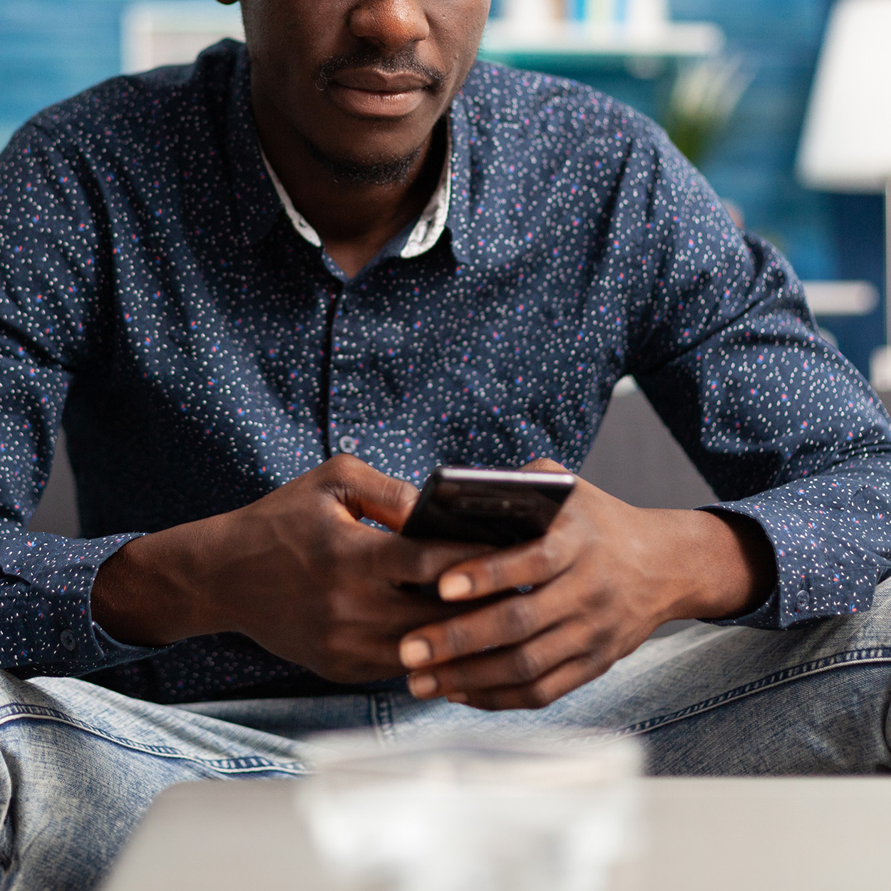 person on laptop seeking out mental health counselling and help